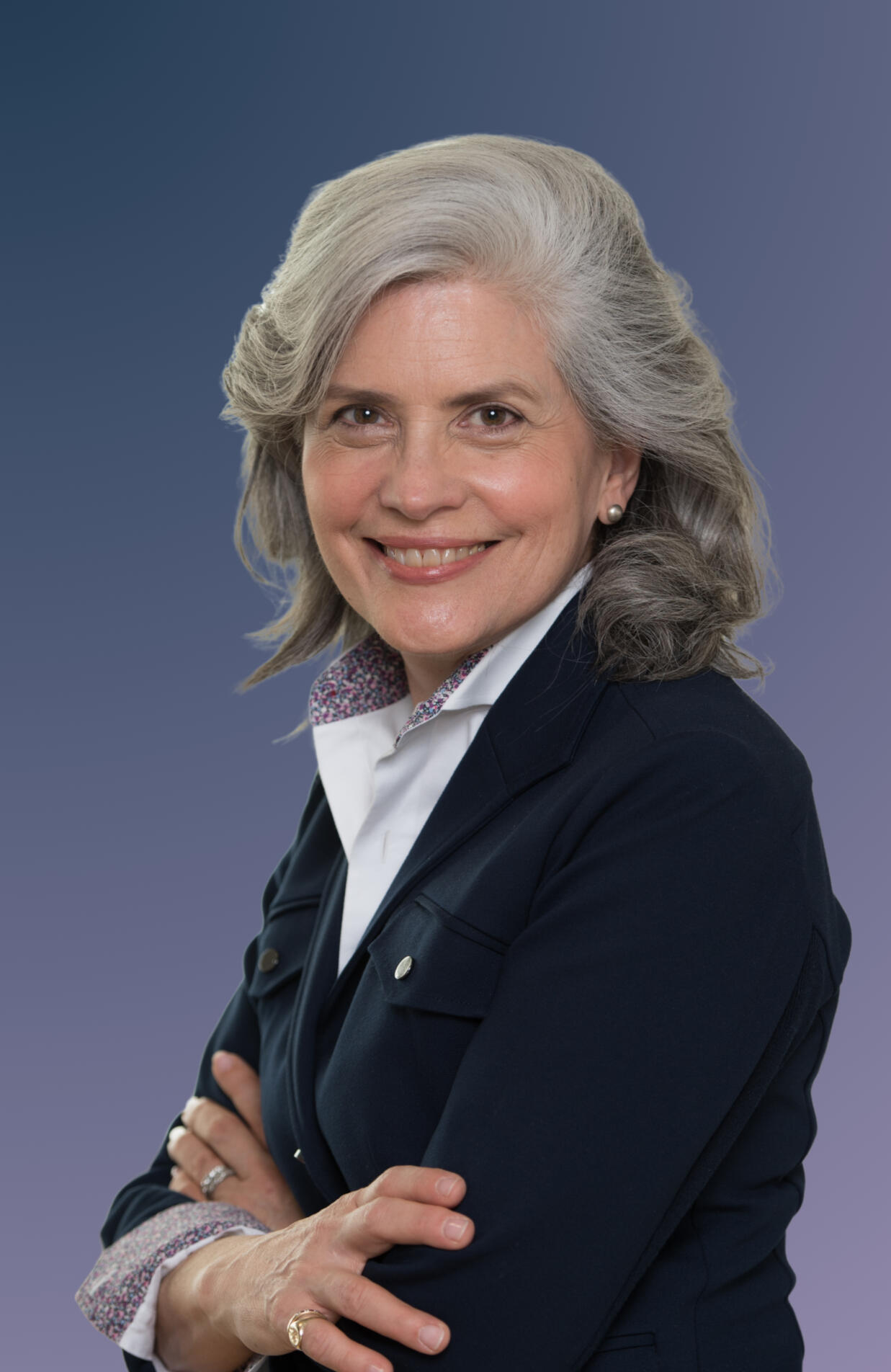 Maria measuring client for a J Hilburn customised suit